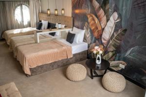 Postel nebo postele na pokoji v ubytování Akacija Luxury Suites