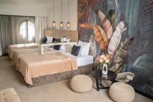 Postel nebo postele na pokoji v ubytování Akacija Luxury Suites
