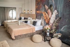 Postel nebo postele na pokoji v ubytování Akacija Luxury Suites