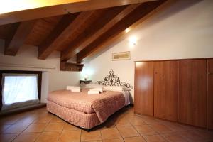 Postel nebo postele na pokoji v ubytování Residence Aquila - Mono Corno Vitello