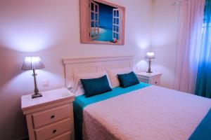 Postelja oz. postelje v sobi nastanitve La Graciosa Mykonos Beach, Junior Suite