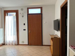 TV a/nebo společenská místnost v ubytování La Roggia