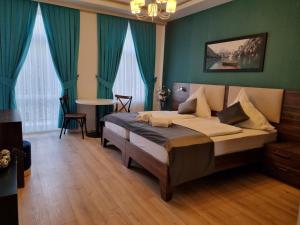 Postel nebo postele na pokoji v ubytování A&F Hotel Chemnitz