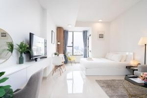 Кровать или кровати в номере Infinity Pool Signature - Saigon Rivergate +102 фотографии