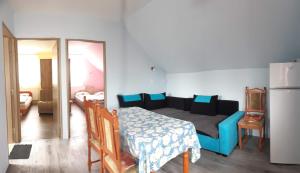 Postel nebo postele na pokoji v ubytování Rózsa Apartment