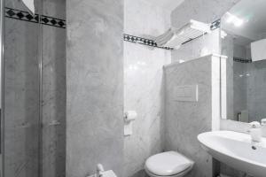 Vannituba majutusasutuses Negritella Sweet Hotel