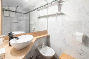 Vannituba majutusasutuses Negritella Sweet Hotel
