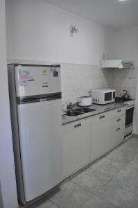 Una cocina o kitchenette en Los Abus
