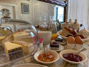 a table topped with lots of different types of food at Maison de l'Aumance in Meaulne