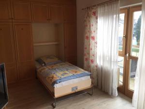 Ein Bett oder Betten in einem Zimmer der Unterkunft Appartements Gillmeier Herta