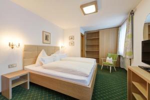 Ένα ή περισσότερα κρεβάτια σε δωμάτιο στο Haus Scheibler