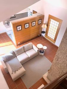 an overhead view of a living room with a couch at TOP BEACH HOUSE in Costa da Caparica