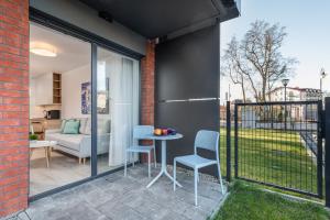 Balkón alebo terasa v ubytovaní Seaside Apartamenty - Olimpijska 2 Mielno - Sauna & Fitness & Parking - w cenie pobytu