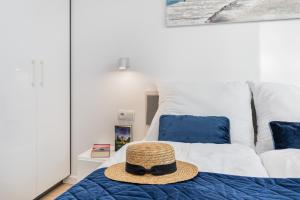Posteľ alebo postele v izbe v ubytovaní Seaside Apartamenty - Olimpijska 2 Mielno - Sauna & Fitness & Parking - w cenie pobytu
