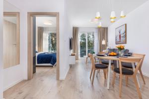 Posteľ alebo postele v izbe v ubytovaní Seaside Apartamenty - Olimpijska 2 Mielno - Sauna & Fitness & Parking - w cenie pobytu