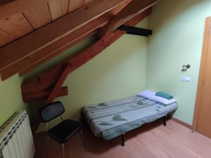 Postel nebo postele na pokoji v ubytování Albergue El Rebezo