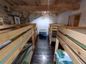 Postel nebo postele na pokoji v ubytování Albergue El Rebezo