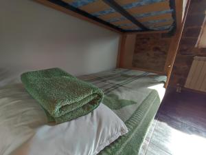 Postel nebo postele na pokoji v ubytování Albergue El Rebezo