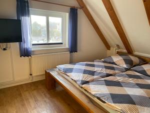 Postel nebo postele na pokoji v ubytování Ferienhaus Maxe, Haus Paula