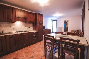 Kuchyň nebo kuchyňský kout v ubytování Residence Aquila - Bilo Testa di Comagna