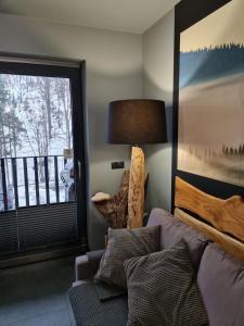 Posedenie v ubytovaní Apartament SPOKOLOKO Mysliwski