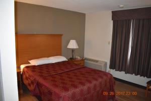 Postel nebo postele na pokoji v ubytování MHO Hotel Bordentown