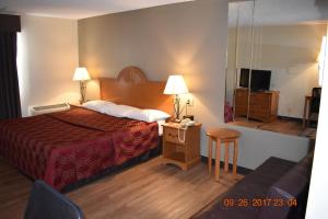Postel nebo postele na pokoji v ubytování MHO Hotel Bordentown