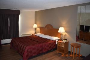Postel nebo postele na pokoji v ubytování MHO Hotel Bordentown