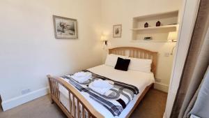 Letto o letti in una camera di The Guards Hotel