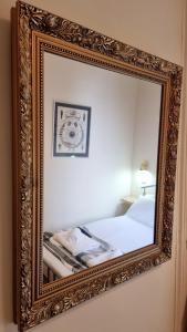 Letto o letti in una camera di The Guards Hotel
