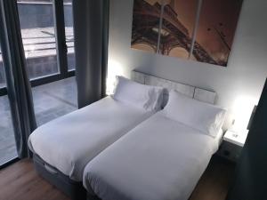 Llit o llits en una habitació de H La Cabaña