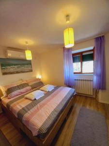 Postel nebo postele na pokoji v ubytování Holiday Home Crikvenica-Kraljevica