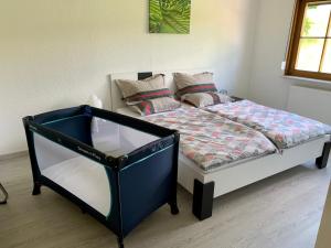 מיטה או מיטות בחדר ב-Brulaire Büsingen am Hochrhein