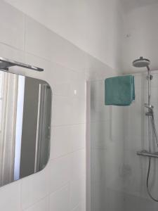 Koupelna v ubytování L'appartement du Café de l'horloge + 12 fotografií