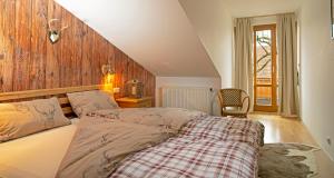 Llit o llits en una habitació de Gasthof - Hotel zur Post