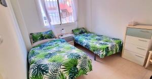 Zdjęcie z galerii obiektu Poolside 2 Bedroom 2 Bathroom Apt, Ultra Fast Wi-Fi & Terrace w mieście Los Alcázares