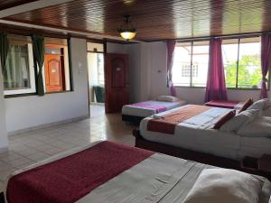 Voodi või voodid majutusasutuse Hotel Yurupary AMAZONAS toas