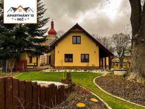 Budova, kde se apartmán nachází + 8 fotografií
