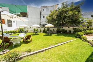 Vonkajšia záhrada v ubytovaní Hotel El Turista
