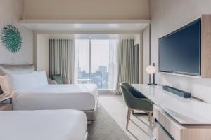 Uma TV ou centro de entretenimento em Vignette Collection SOUMA Hotel by IHG