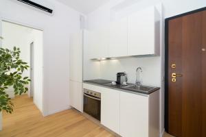 A kitchen or kitchenette at Bright Terrace in Milano
