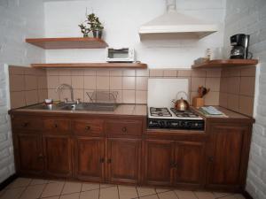 Kuchyň nebo kuchyňský kout v ubytování Apartamentos Otorongo Cuenca Ecuador