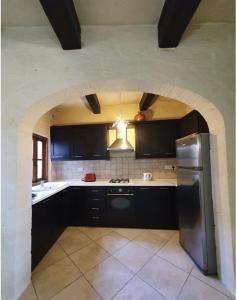Kuchyň nebo kuchyňský kout v ubytování Petra Farmhouse B&B