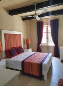 Postel nebo postele na pokoji v ubytování Petra Farmhouse B&B