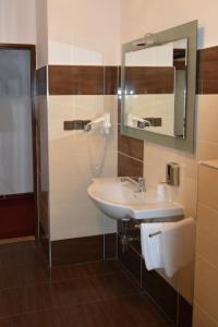 Vannituba majutusasutuses Hotel Koruna