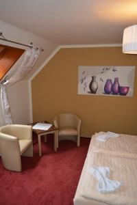 Voodi või voodid majutusasutuse Hotel Koruna toas