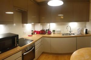 a kitchen with a sink and a counter top at Double room with bathroom in central London - Vauxhall in London