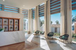 A seating area at Iberostar Waves Cala Domingos All Inclusive