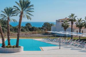 The swimming pool at or close to Iberostar Waves Cala Domingos All Inclusive