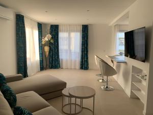 Телевизор и/или развлекательный центр в DOUCEURS DES ILES